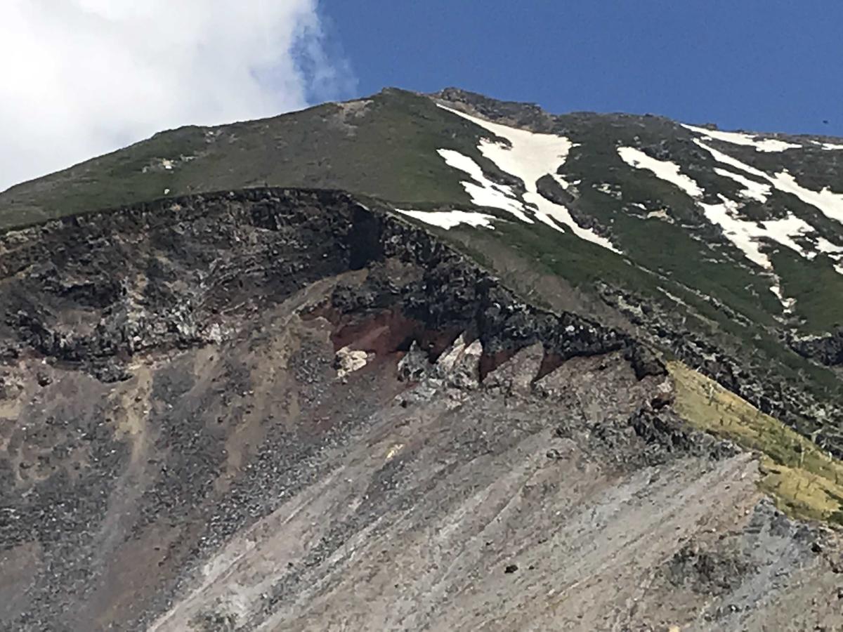 Cross-section view of top of Mt. Ontake collapse shows the multi-colored rock strata