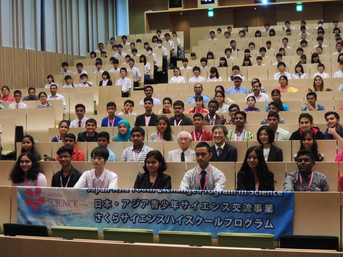 Students in group photo with Dr. Maskawa after lecture