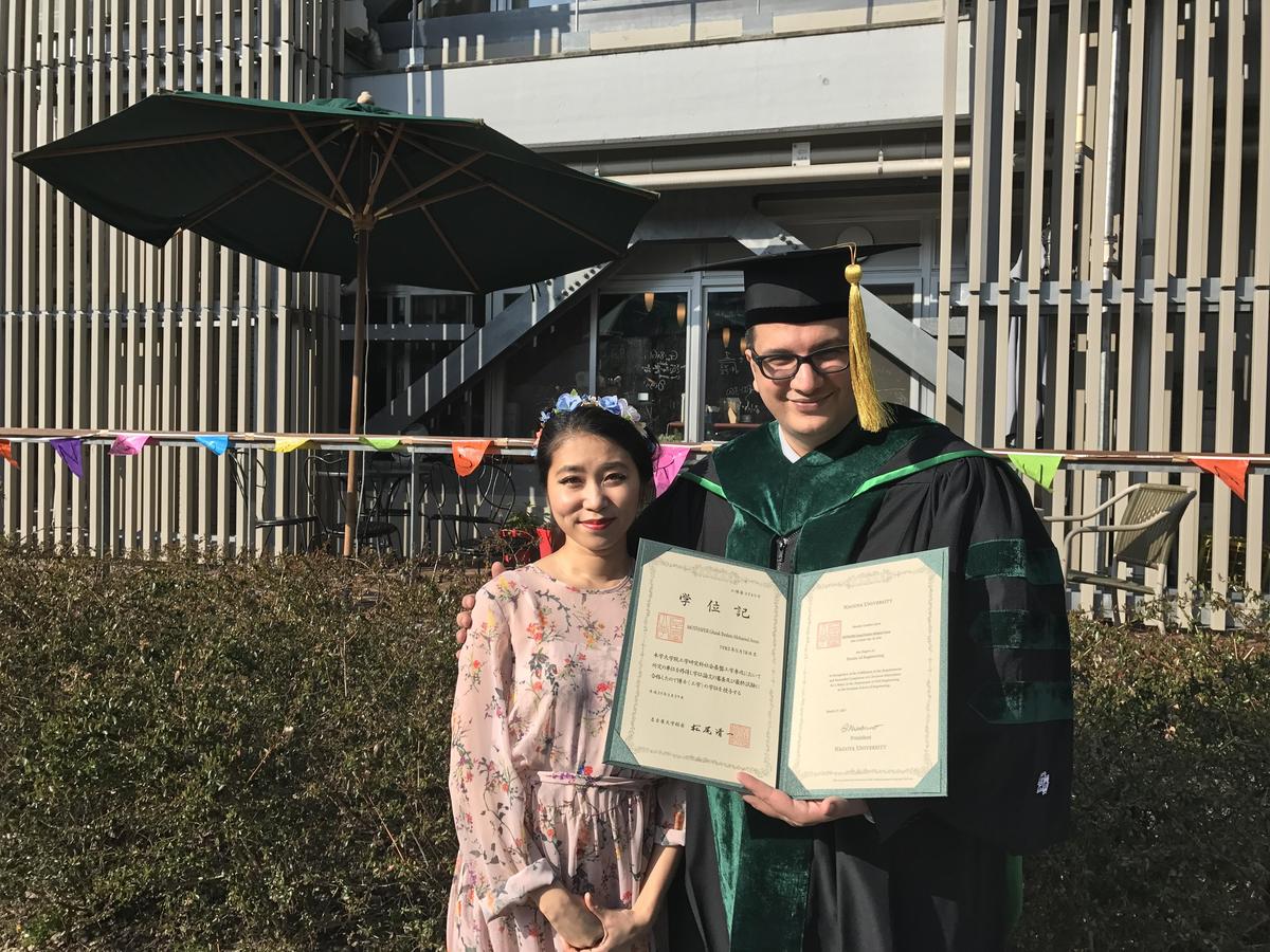 Ito (left) and Ghasak (right) with his Ph.D. certificate