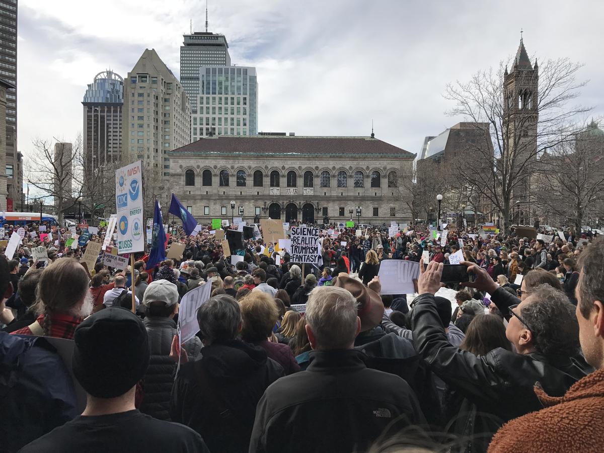 Placards appeal to “Save Science” at a demonstration in Boston (February 19)