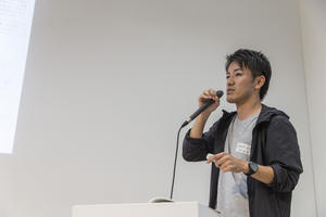 Mr. Yuki Kataoka delivering a presentation (Photo provided by the Wood House Design Grand Prix office)