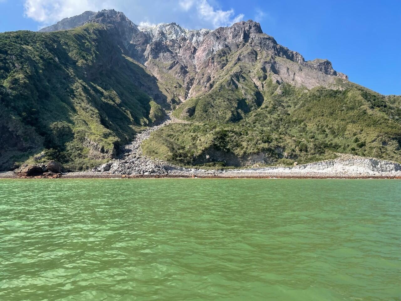 The photo was taken by the research team on Iwo Island in the Satsunan Archipelago, Kyushu, in 2023. They measured the underwater transmission spectrum, iron oxide concentration, and the cyanobacterial species present. Credit: Taro Matsuo