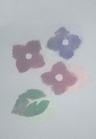 Figure 2: A colored diagram obtained by spraying FeCl3 aqueous solution (10 mg/mL) onto the whitish sheet via a mask and drying.