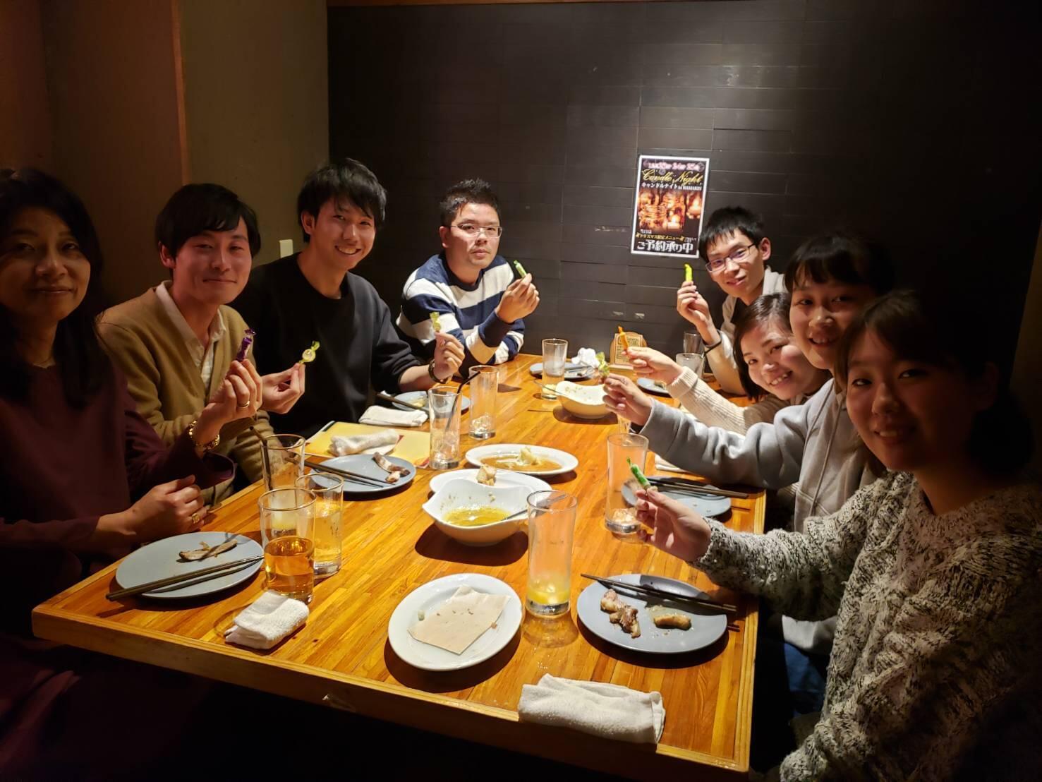 A social event with members of his laboratory (December 2019)