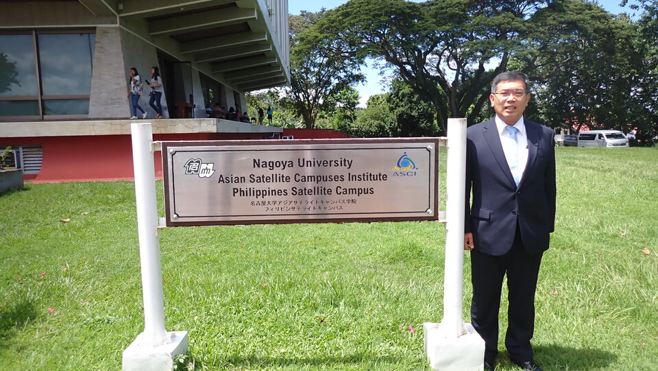 Dean Mikio Nakazono of the Nagoya University Graduate School of Bioagricultural Sciences stands next to the Asian Satellite Campuses sign on the UPLB campus. (October 9, 2023)