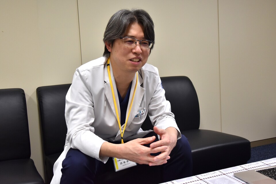 Associate Professor Nishio graduated from Nagoya University School of Medicine. He remarks, "Nagoya University has a calm atmosphere, making it an ideal environment for research."