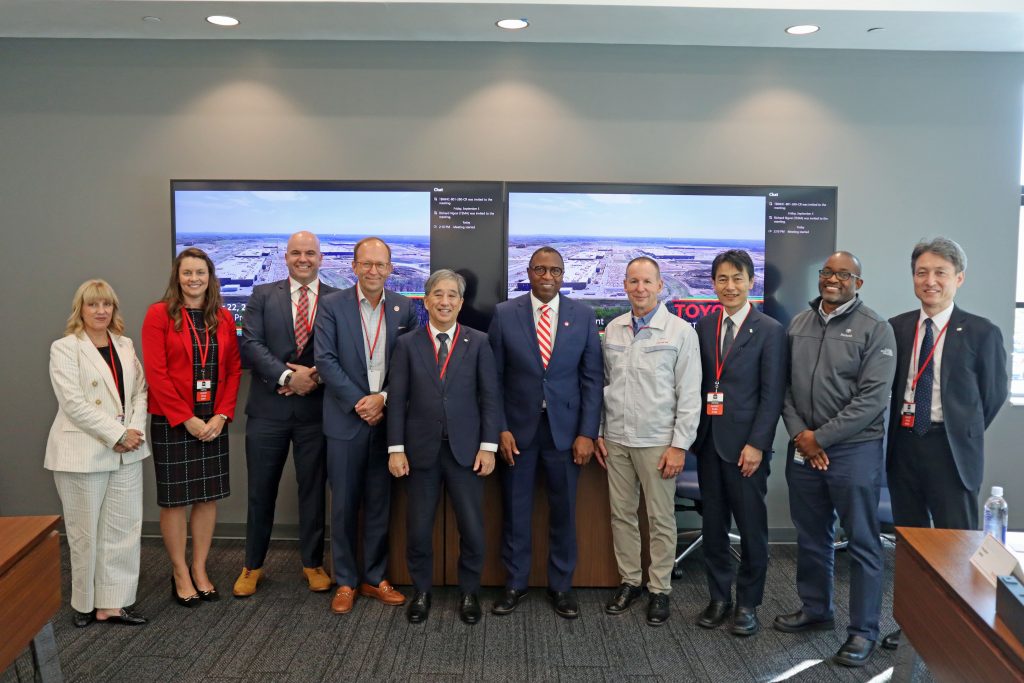 The delegation poses for a photo with staff from Toyota Battery Manufacturing North Carolina