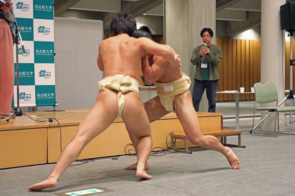 Members of the sumo club give a demonstration of their techniques