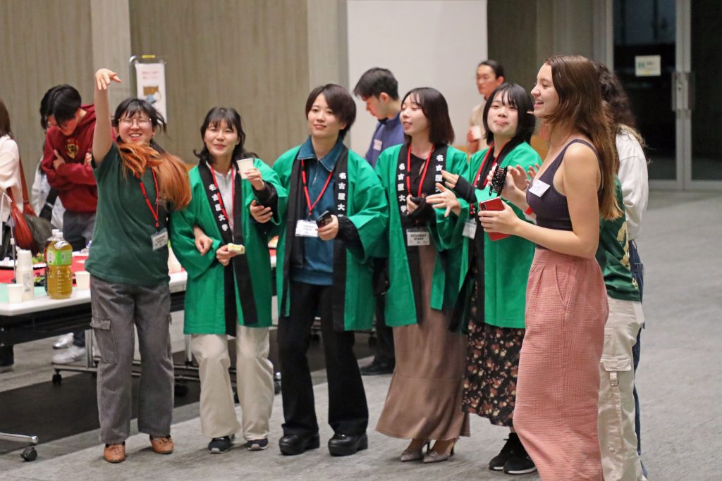 The crowd sings along to COFSA's performance