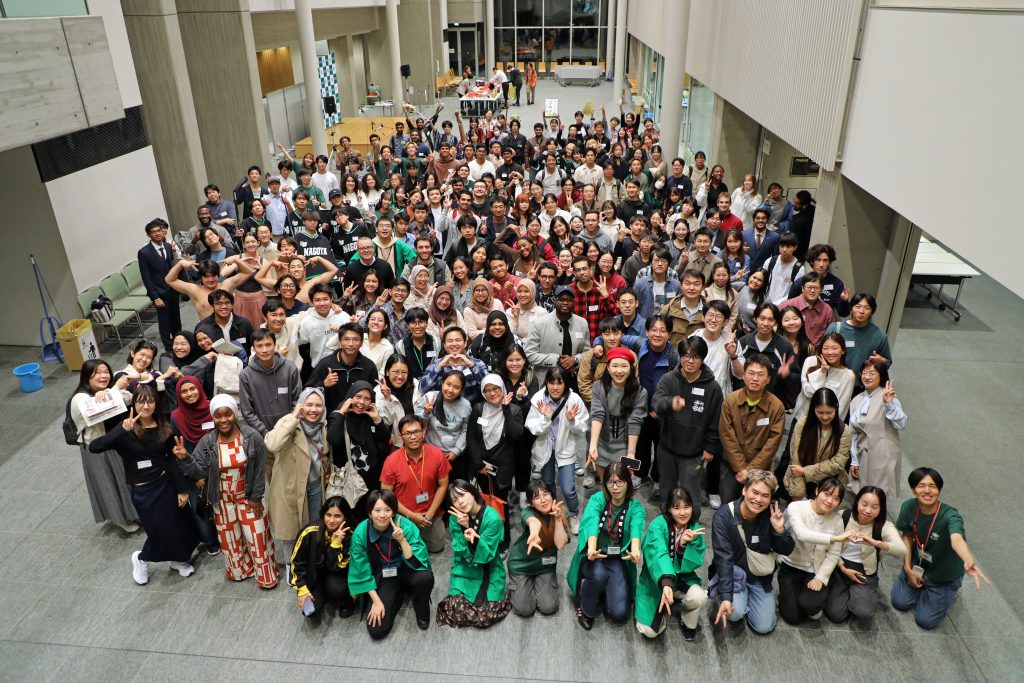 International students gather for a group photo during the Welcome Party
