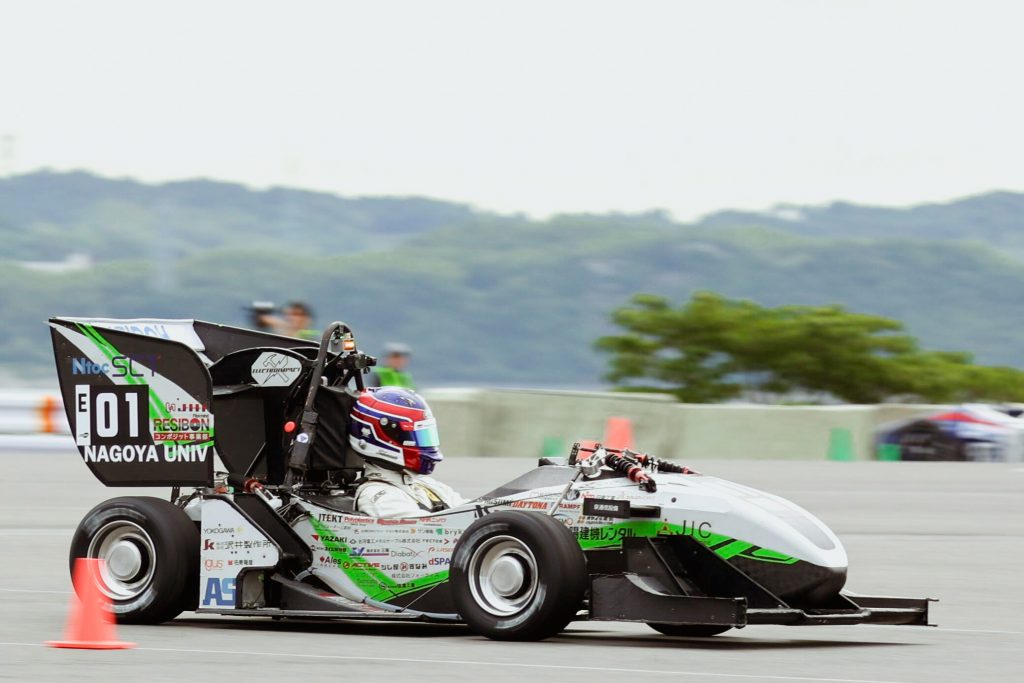 An acton shot of the Nagoya University Formula Team FEM car during the competition.
