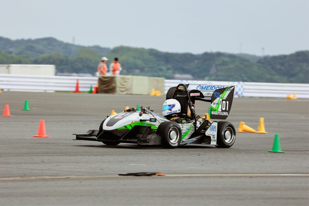 An acton shot of the Nagoya University Formula Team FEM car during the competition.
