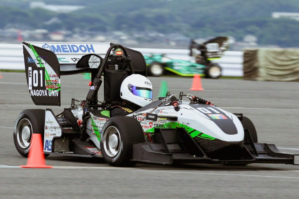 An acton shot of the Nagoya University Formula Team FEM car during the competition.