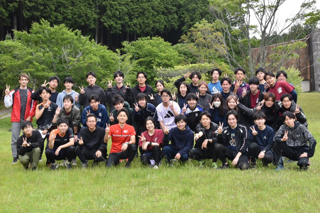 The Nagoya University Orienteering club poses for a group photo.