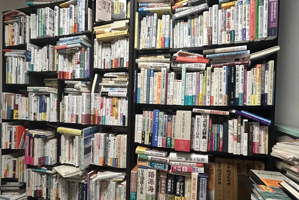 Crammed bookshelves inside Mizuno's apartment.