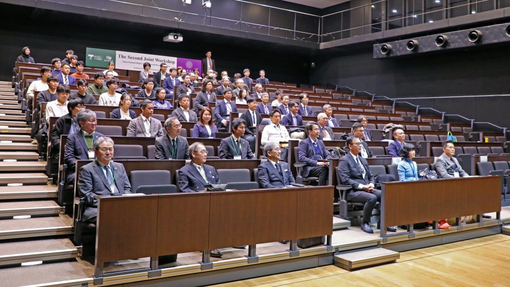 Participants sit auditorium-style seating during the event.