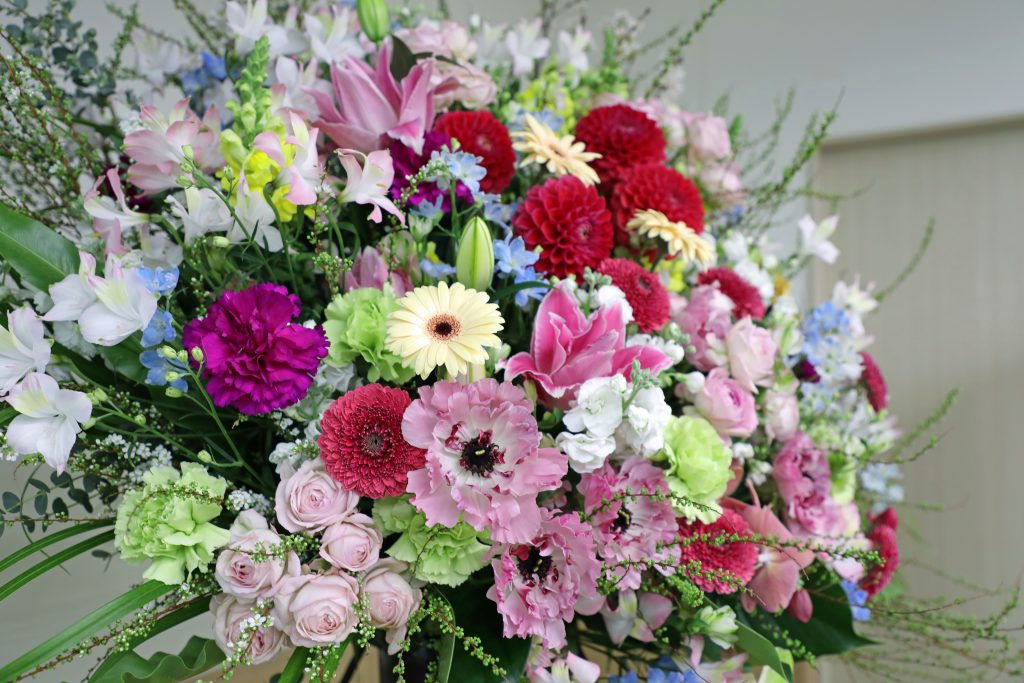 A photograph of a flower display that was in the room during the event.