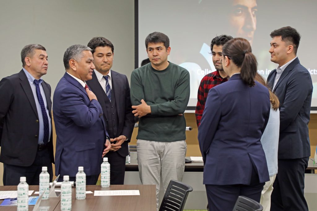 Kakhramon Kuranbaev talks with students before his lecture.