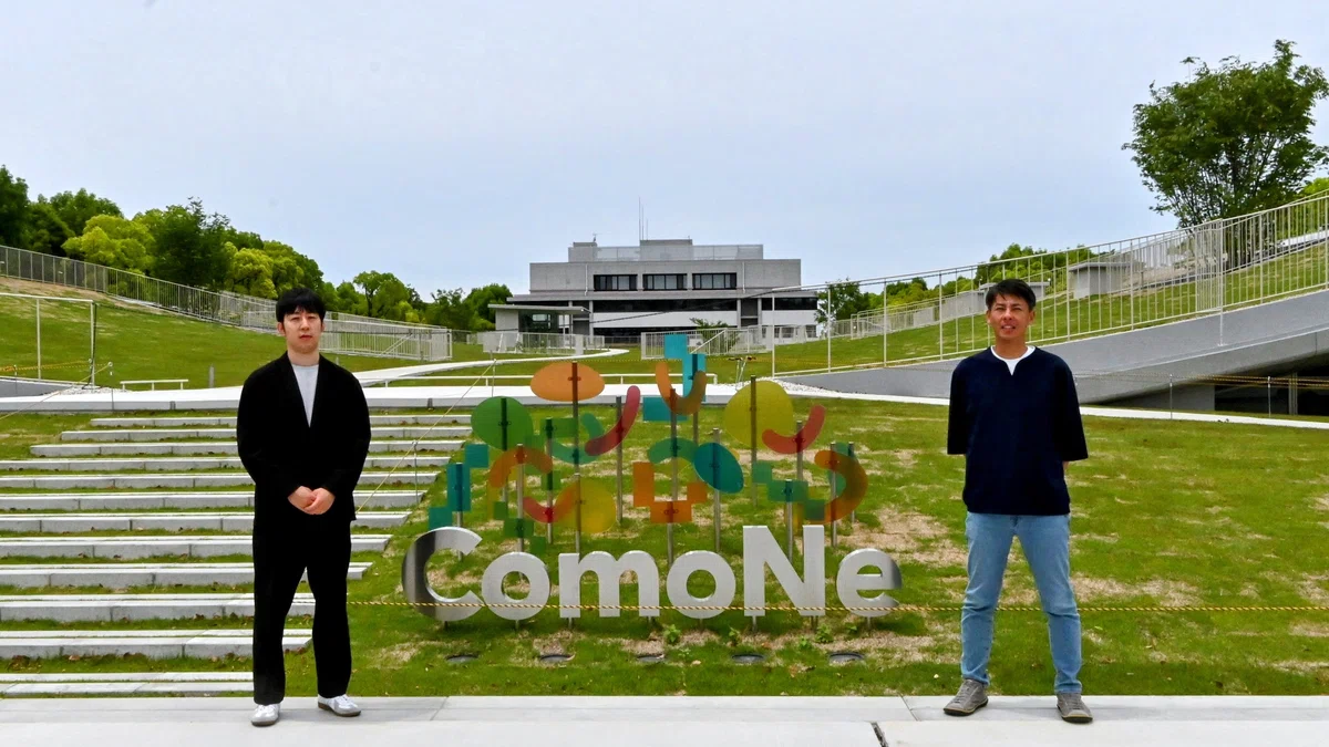 The unusual design of the ComoNe logo started with a microscope and a handful of soil