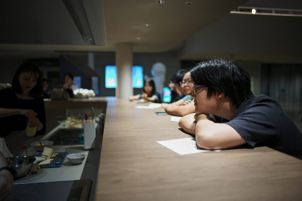 Student observes as food is being prepared