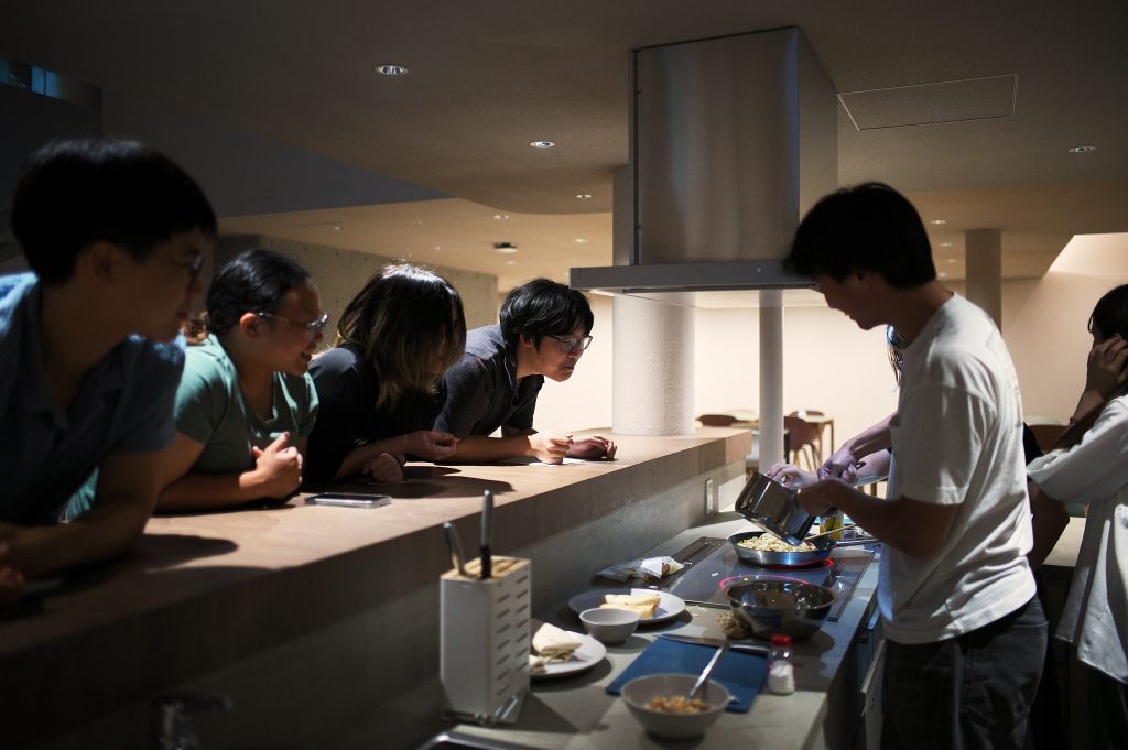 Student observes as food is being prepared