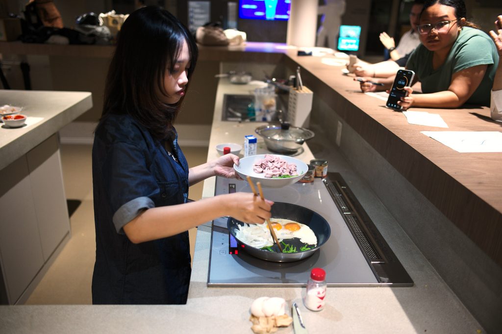 Student prepares fried rice dish